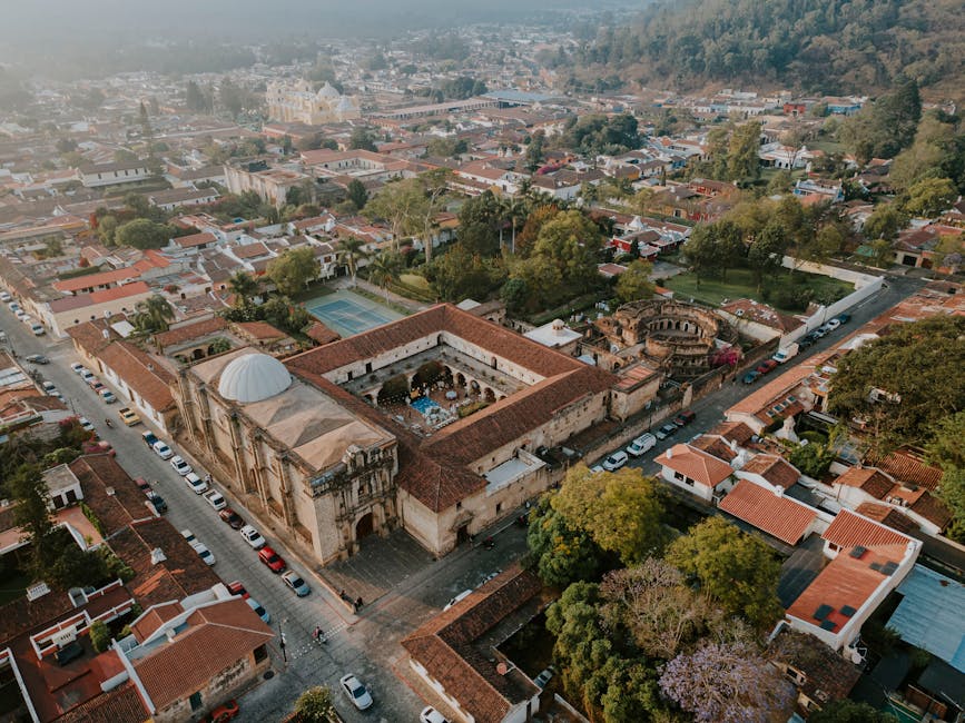 Aerial view over Antigua Guatemala colonial rooftops