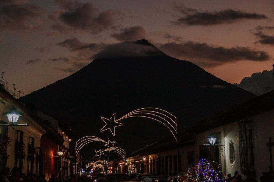 Antigua at Christmas with Volcán de Agua at dusk