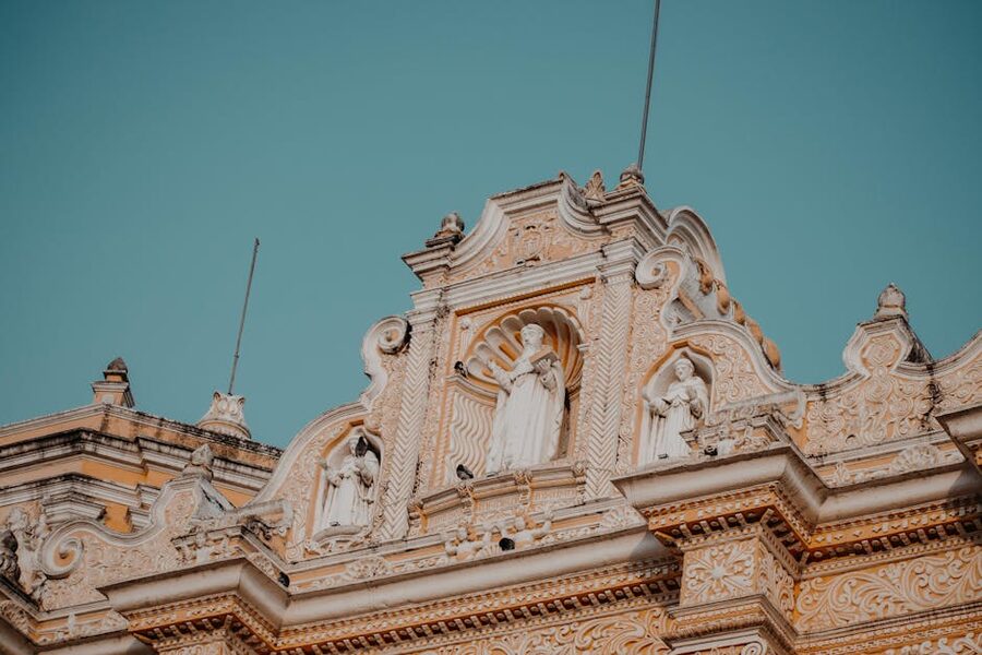 Baroque yellow facade of La Merced church in Antigua