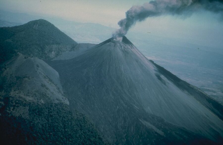 Pacaya Volcano erupting with lava flow and ash plume in Guatemala