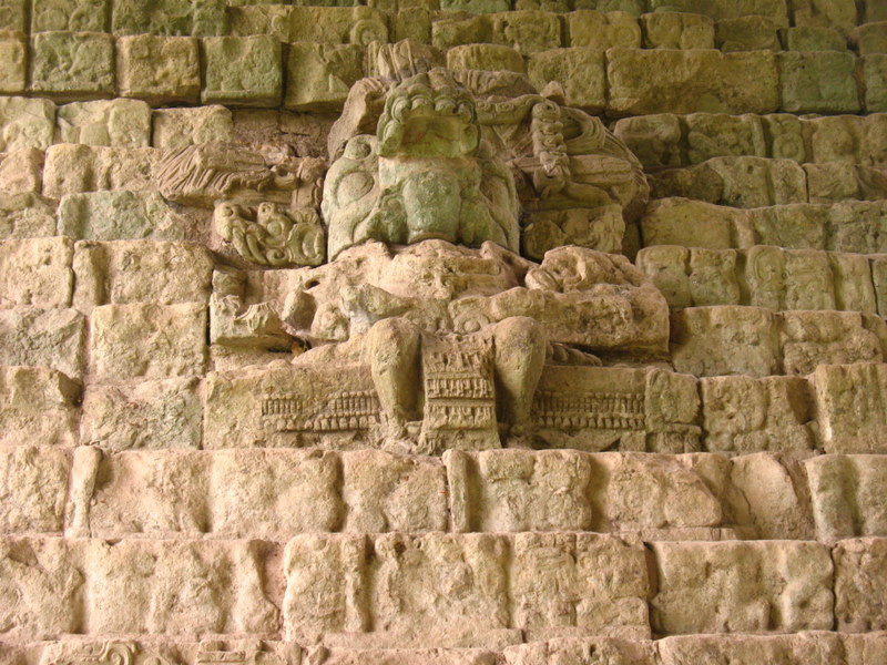 Detail of a carved Mayan figure on a stairway block at Copán