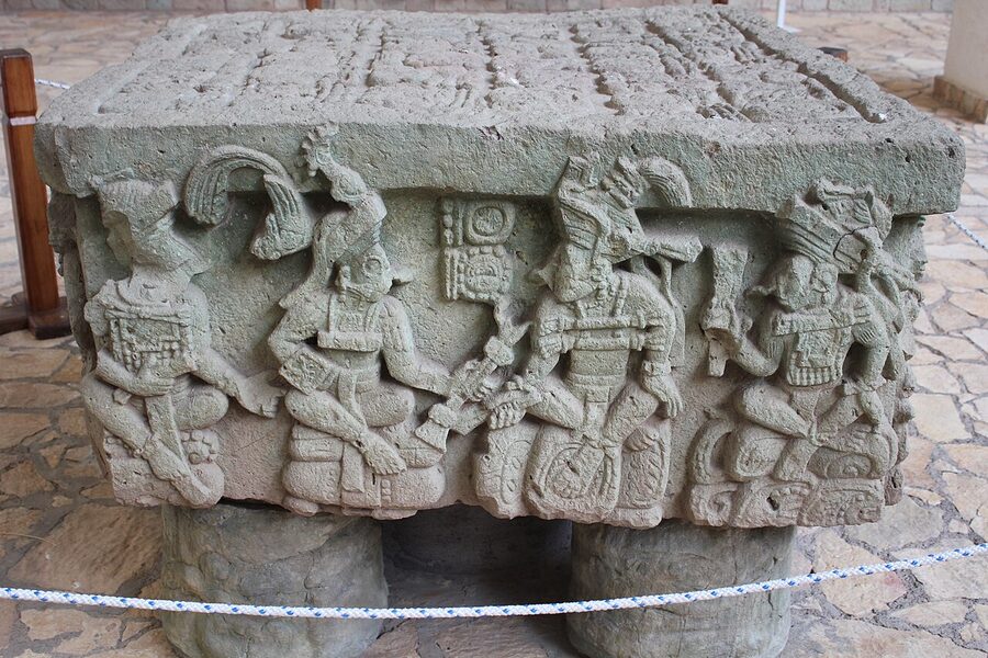 Altar Q at Copán Sculpture Museum, a square stone altar carved with sixteen seated rulers around its sides