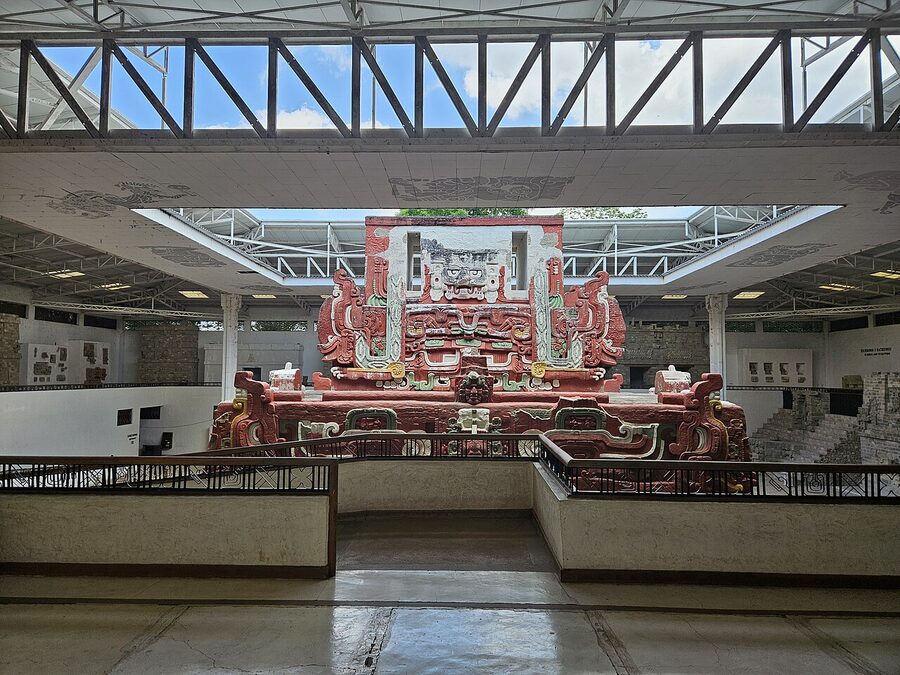Interior of the Sculpture Museum at Copán with the full-scale red and green replica of the Rosalila Temple under a glass roof