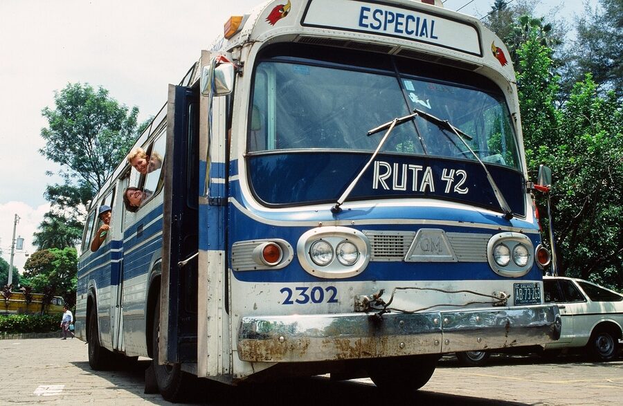 Salvadoran chicken bus camionetas on a country road, El Salvador