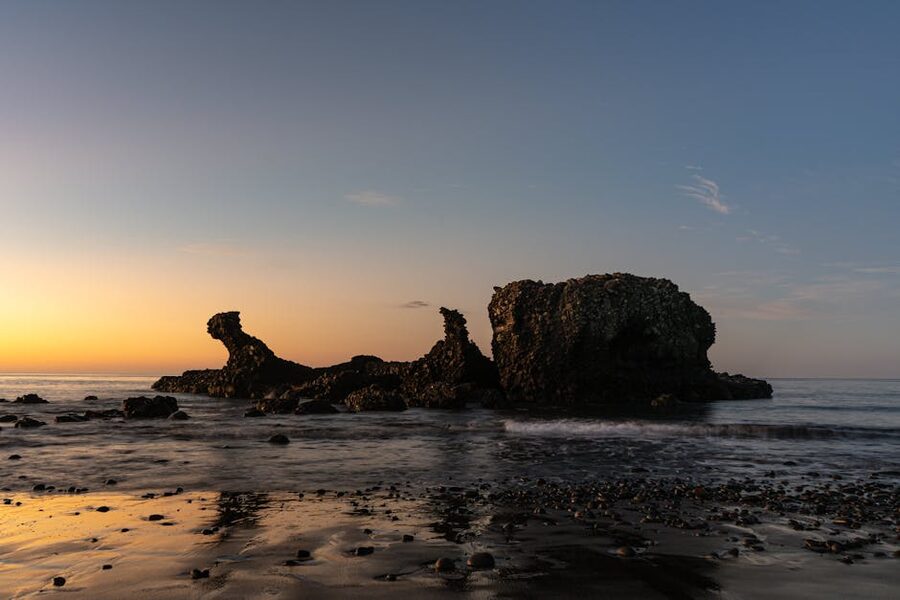 El Tunco rock formation at sunset on the Pacific coast of El Salvador