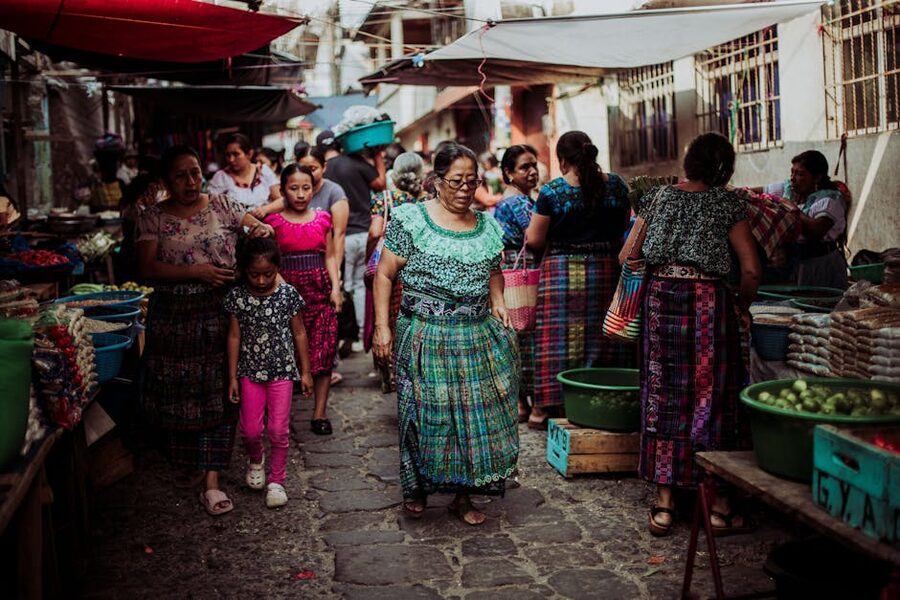 Women in colourful traditional dress at a Guatemalan market