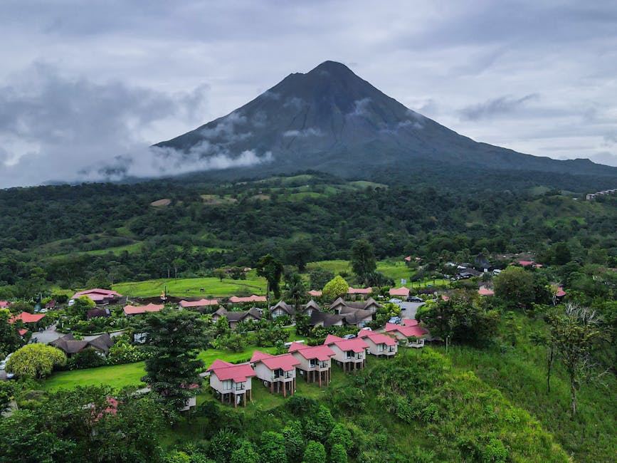 La Fortuna village rooftops with Arenal Volcano in background, Costa Rica
