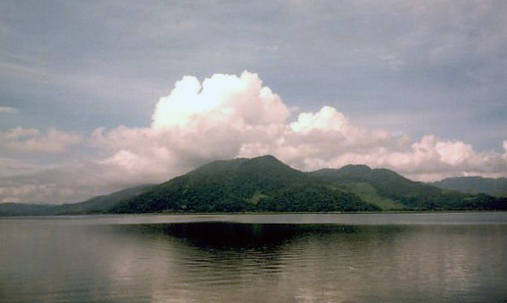 Boats moored on the calm shore of Lago de Yojoa, Honduras