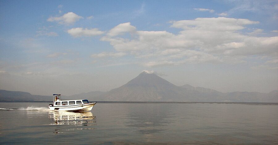 A public lancha boat on Lake Atitlan with Volcan San Pedro rising behind
