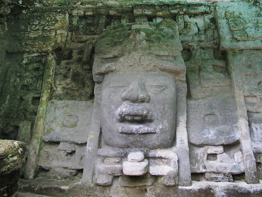 Stucco mask carved into Lamanai pyramid in northern Belize