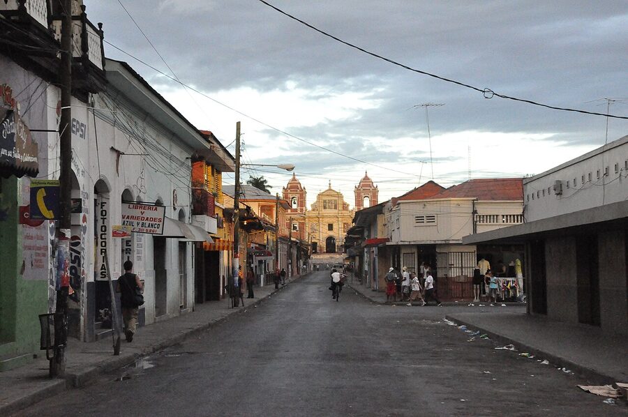 A colonial street in León, Nicaragua, with low-rise buildings
