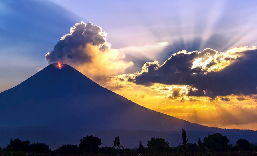 Active volcano in León, Nicaragua, with sunset glow