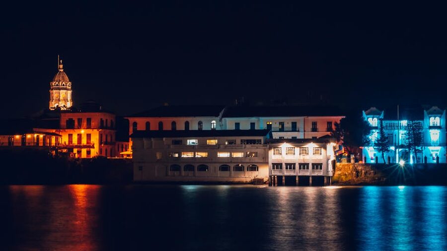 Casco Viejo waterfront at night with the cathedral spire lit up