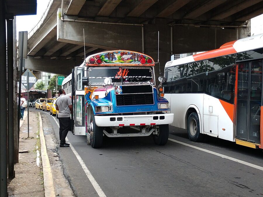 Brightly painted Diablo Rojo bus in Panama City traffic
