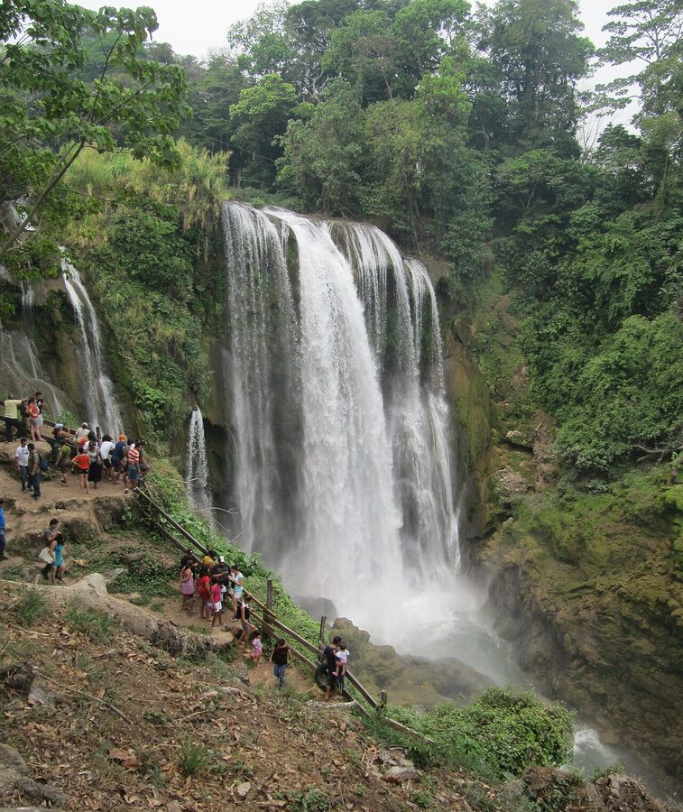 Pulhapanzak waterfall plunging into a green pool, Honduras