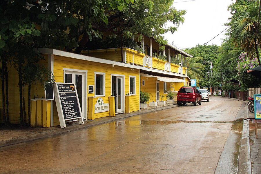 Yellow guesthouse on West End main road Roatán