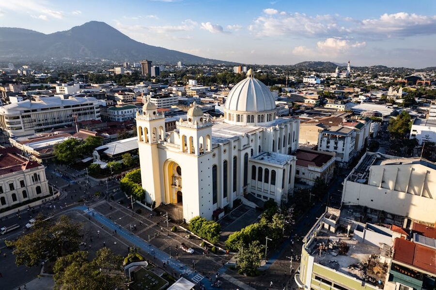 Aerial view of San Salvador with the cathedral in the foreground and city buildings beyond