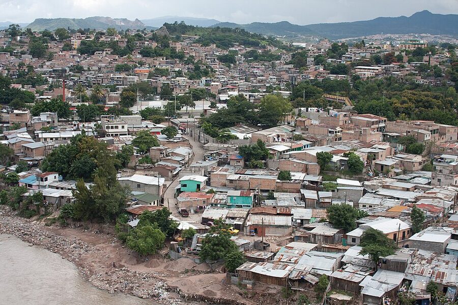 Wide view of Tegucigalpa Honduras with mountains and afternoon clouds