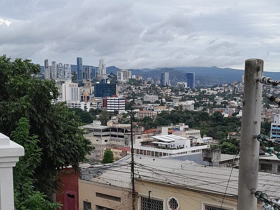 Aerial view of Tegucigalpa city with hillside neighbourhoods and skyline