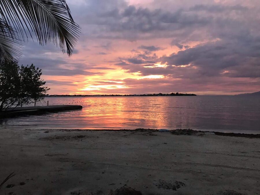 Sunset over the Caribbean from Utila beach, Bay Islands Honduras