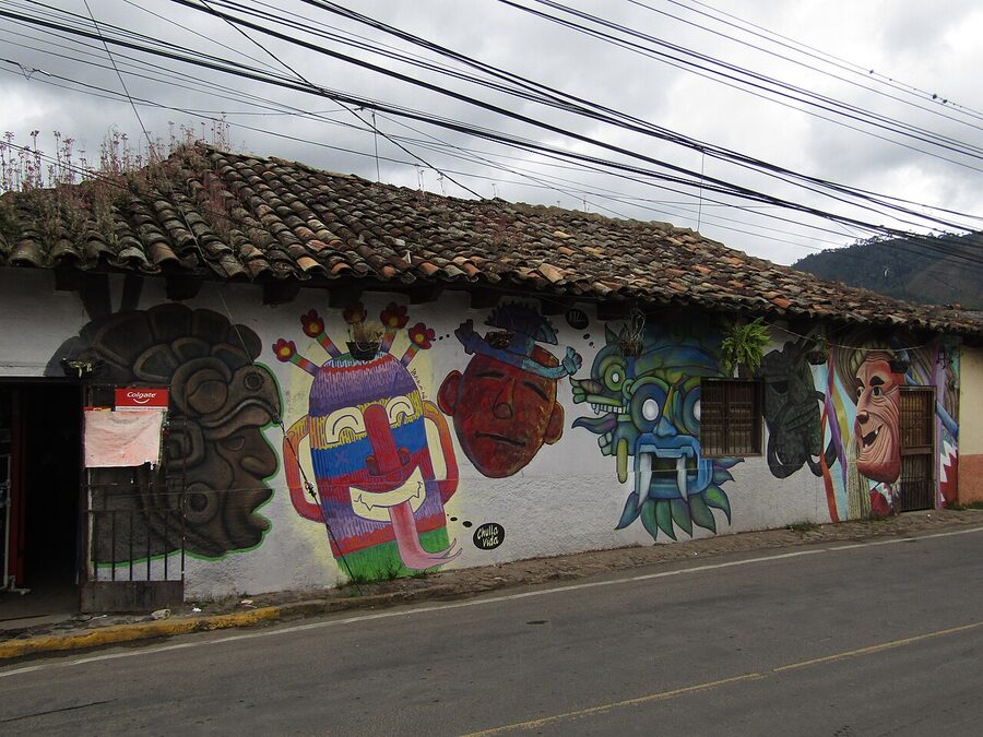 Painted mural shop in Valle de Angeles featuring colourful Mayan-style art