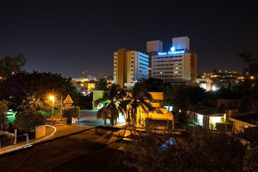 Tegucigalpa long exposure night view with lit Banco Continental tower