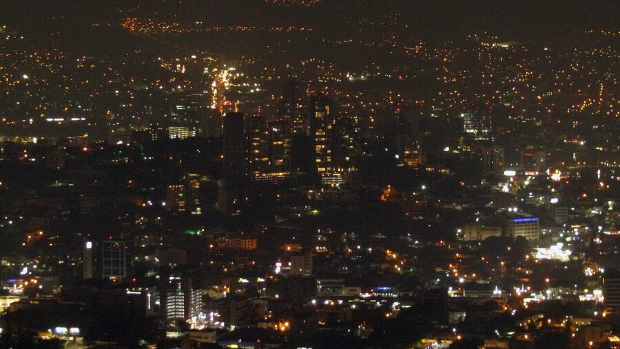 Tegucigalpa skyline at night with city lights spreading across the valley